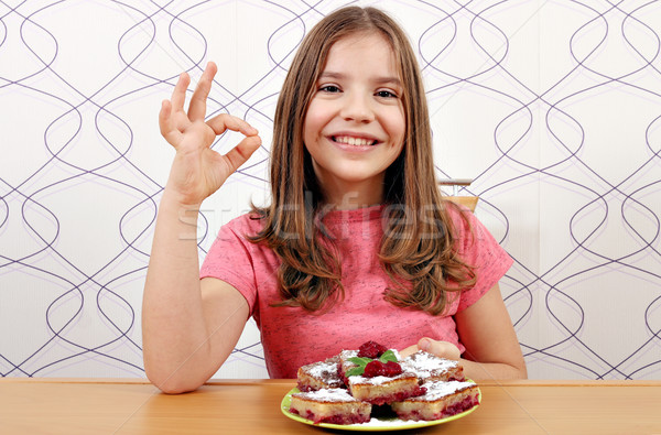 happy little girl with cherry pie and ok hand sign Stock photo © goce
