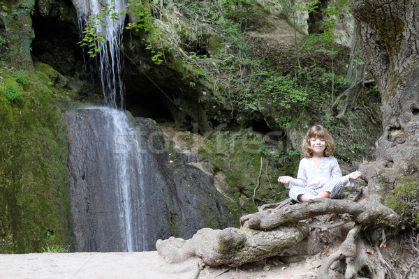 little girl meditate by the waterfall Stock photo © goce