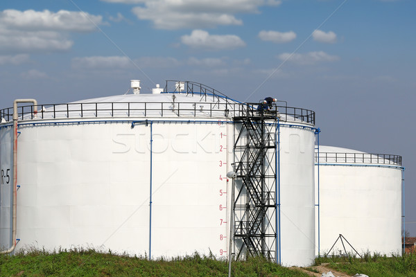 oil tanks and workers industry zone Stock photo © goce