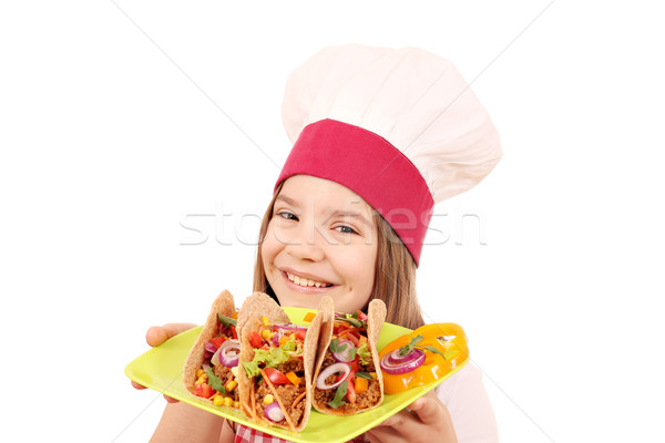 Boldog kislány szakács taco gyorsételek lány Stock fotó © goce