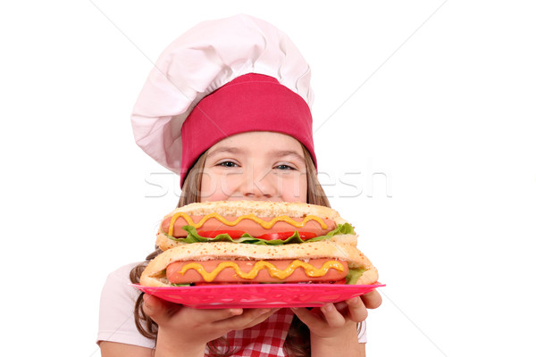 Petite fille Cook hot dog fille enfant amusement [[stock_photo]] © goce