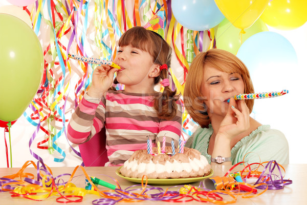 happy daughter and mother on birthday party Stock photo © goce