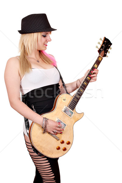 Nina sombrero jugar guitarra eléctrica mujer sonrisa Foto stock © goce