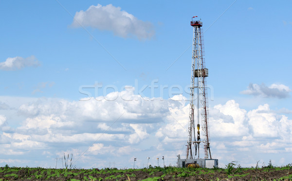 land oil drilling rig on field landscape Stock photo © goce