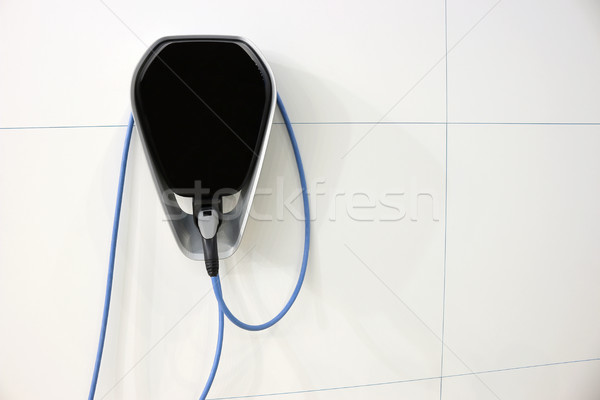 electric car battery charger on wall Stock photo © goce