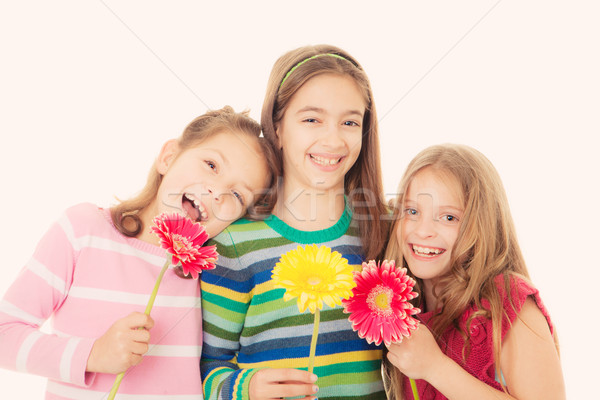 Stock photo: happy children with flowers