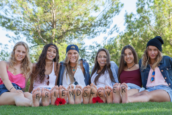 group of happy fashion teenagers friends Stock photo © godfer