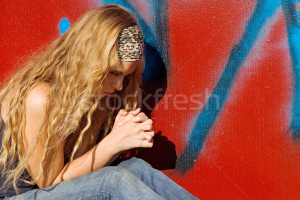 christian girl or teen saying prayers, hands clasped praying Stock photo © godfer