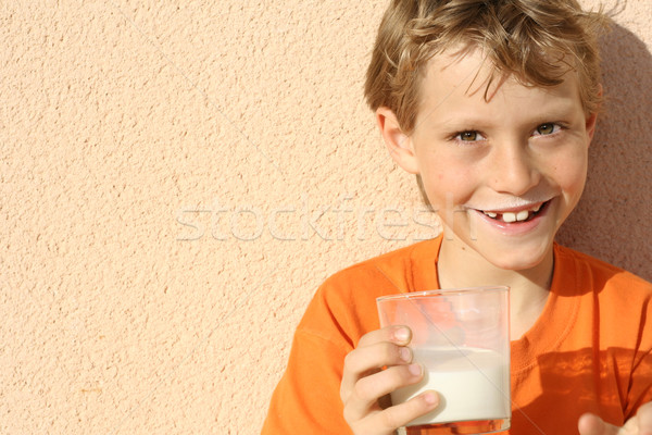 Stock photo: healthy kid drinking glass of milk