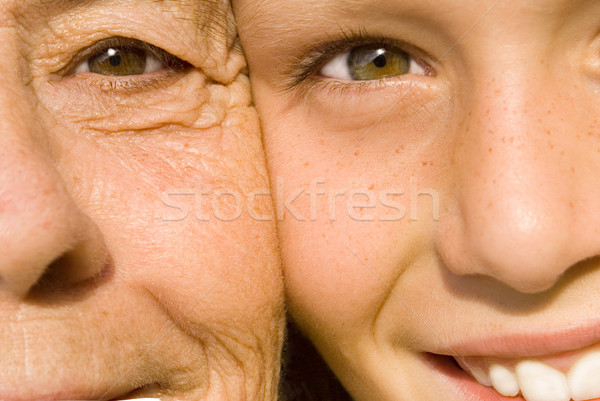 Stock photo: senior and child close up of faces and skin