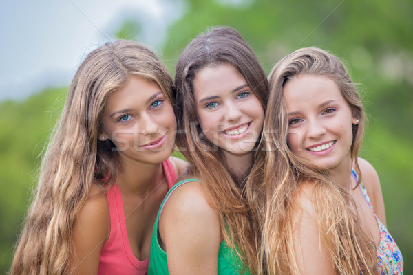 beautiful young girls with perfect skin teeth and har.  Stock photo © godfer