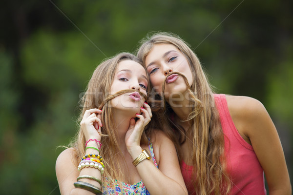 healthy young teens goofing about.  Stock photo © godfer