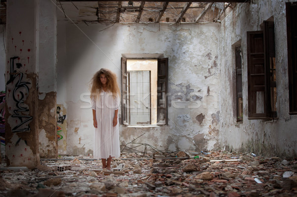 ghost woman in abandoned house Stock photo © godfer