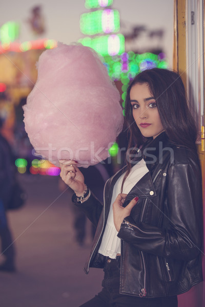 young woman at funfair with candy floss.  mood lighting Stock photo © godfer