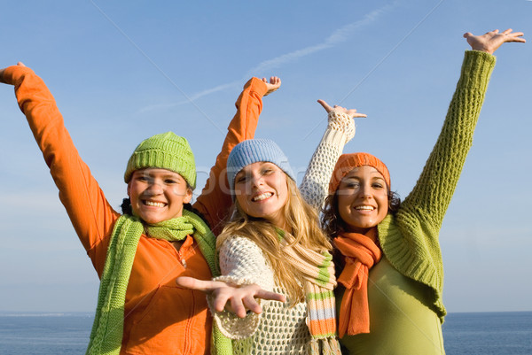 group of diverse kids with arms outstretched Stock photo © godfer