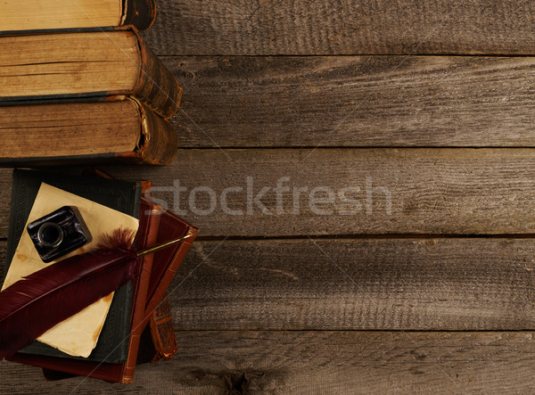 Antique books, quill pen and ink pot Stock photo © goir