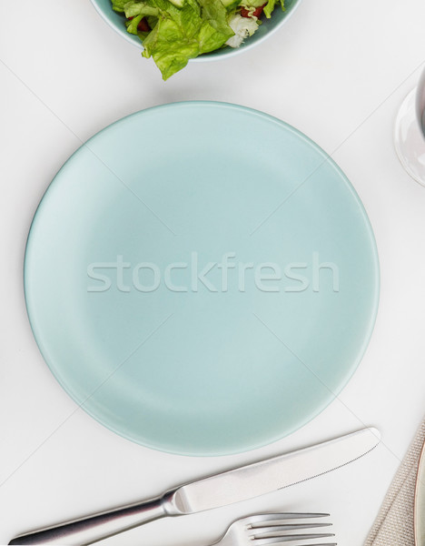 Empty plate on a dining table Stock photo © goir