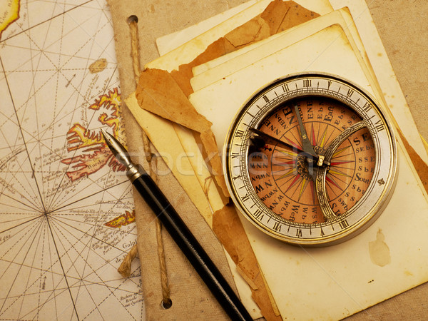 Navigációs iránytű papírok levelek régi térkép vitorlázik Stock fotó © goir