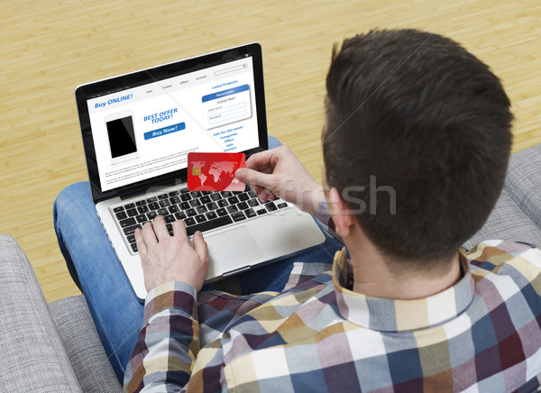 Ecommerce człowiek domu zakupy online laptop Zdjęcia stock © goir