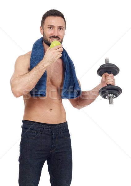 Gezonde gespierd man gewichten appel Stockfoto © goir