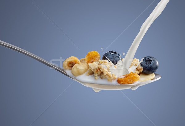 Breakfast cereal on a spoon Stock photo © goir