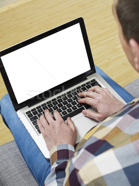 Uomo laptop lavoro tecnologia maschio digitando Foto d'archivio © goir