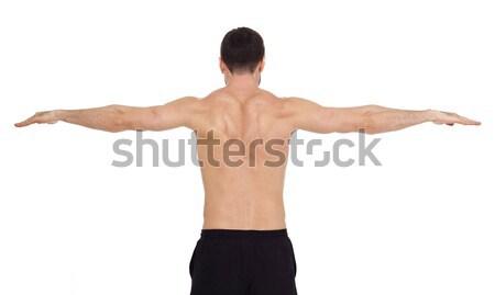 Evenwicht shirtless gespierd man geïsoleerd witte Stockfoto © goir