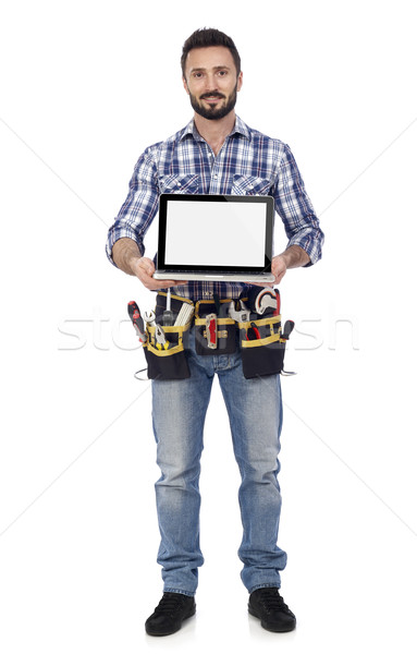 Stock photo: Carpenter showing laptop