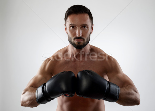 Boxeador muscular guantes de boxeo deporte gimnasio boxeo Foto stock © goir