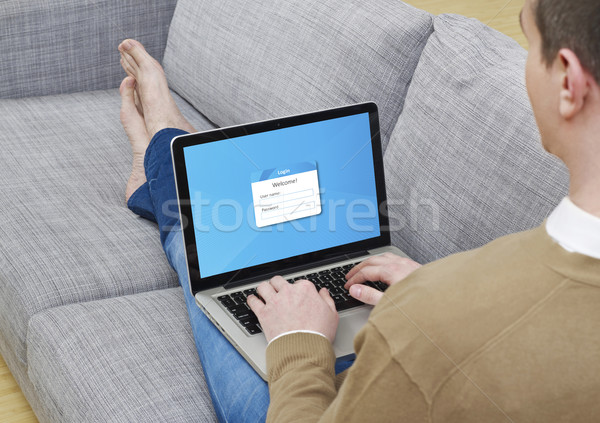 Inloggen laptop man bank internet technologie Stockfoto © goir