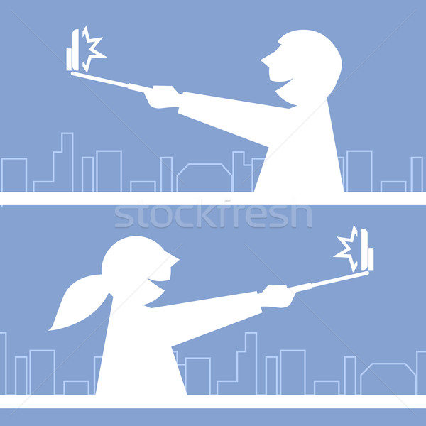 Girl and boy taking a photo with selfie stick - traveling people Stock photo © gomixer