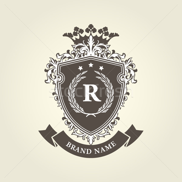 medieval royal coat of arms - shield with crown and laurel wreat