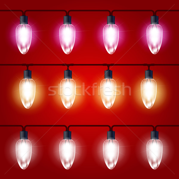 Christmas Lights - festive luminous garland with light bulbs Stock photo © gomixer