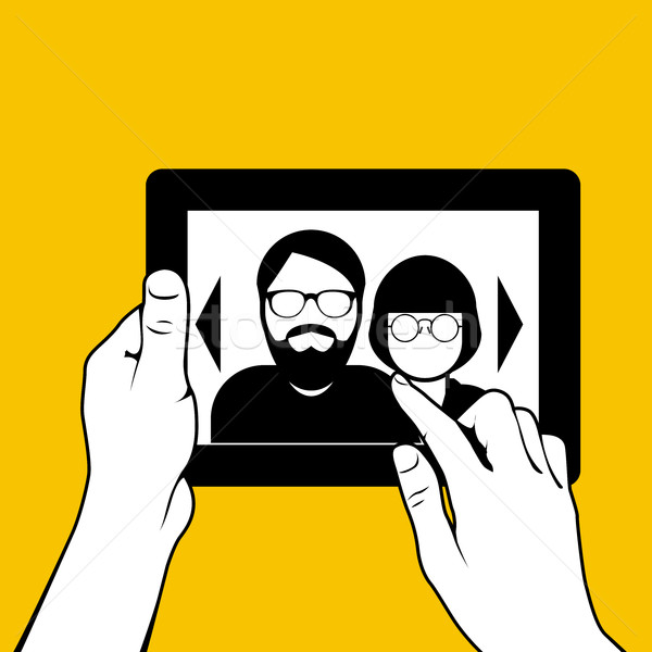 商业照片 / 矢量图: hands with tablet pc - looking through photos