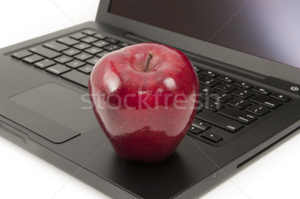 Mela rossa laptop computer tastiera del computer portatile business studente Foto d'archivio © Gordo25