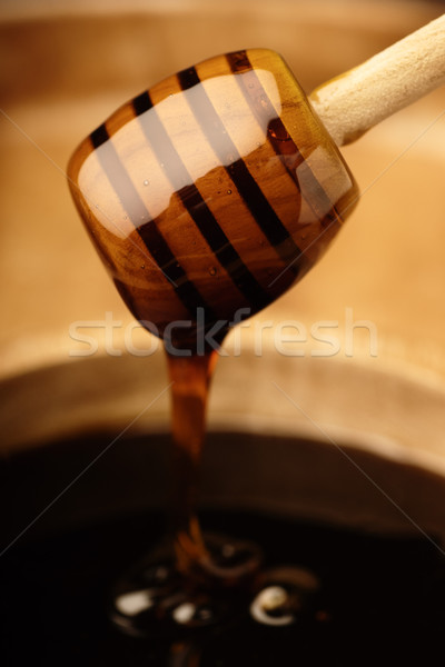 Dripping honey Stock photo © gorgev
