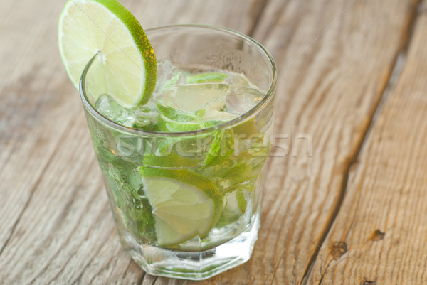 Mojito vidro madeira fruto verão folhas Foto stock © gorgev