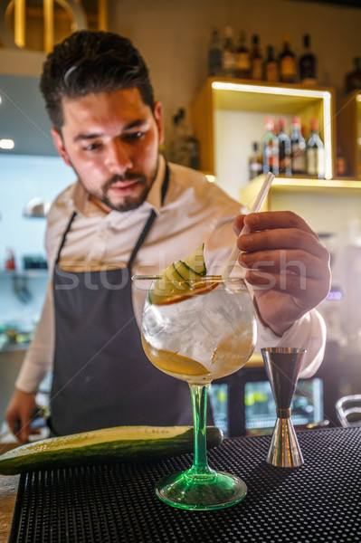 Barman is decorating cocktail Stock photo © grafvision