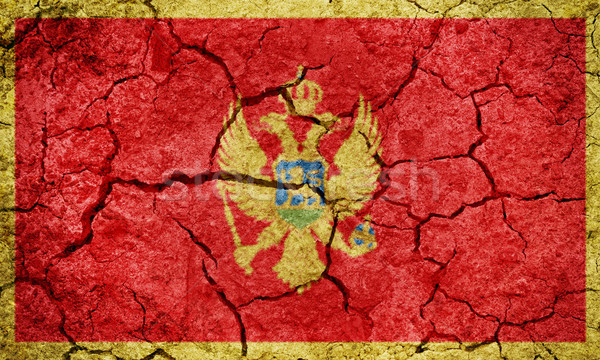 Czarnogóra banderą wyschnięcia ziemi ziemi tekstury Zdjęcia stock © grafvision