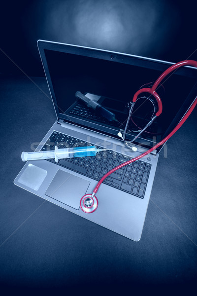Laptop with a stethoscope Stock photo © grafvision