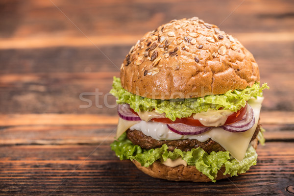 Groß Hamburger Jahrgang Holz Oberfläche Fleisch Stock foto © grafvision