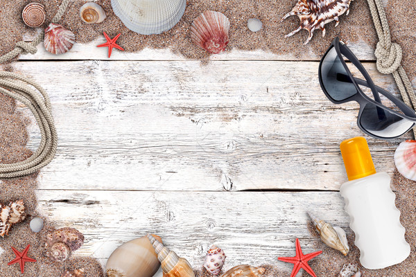 Suntan lotion and sea shells Stock photo © grafvision