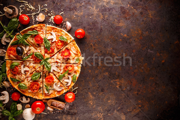 Gustoso pizza ingredienti spazio testo foglie Foto d'archivio © grafvision