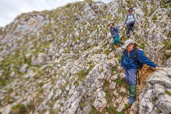 Mother and kids on mountain trek Stock photo © grafvision