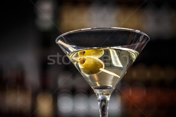 Martini koktél zöld olajbogyók közelkép üveg Stock fotó © grafvision