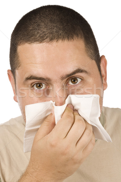 Stock photo: man blowing his nose