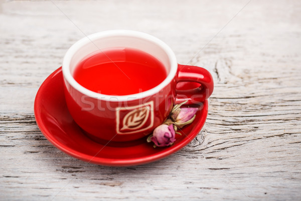 Rosa bud tè rosso Cup vecchio Foto d'archivio © grafvision