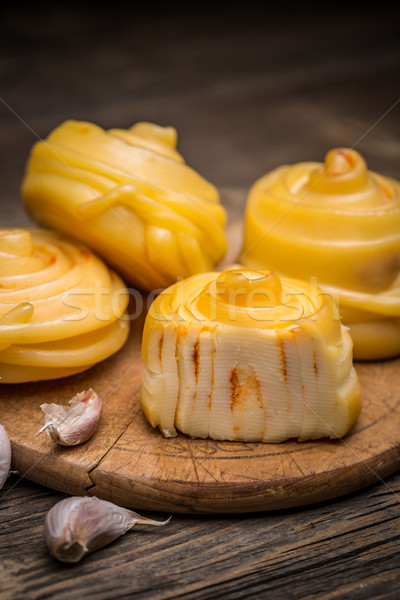 Twisted handicraft cheese  Stock photo © grafvision