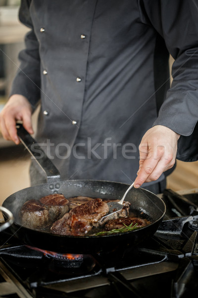 Chef in restaurant kitchen Stock photo © grafvision
