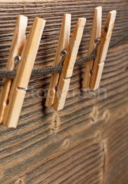 Three clothespins on rope Stock photo © grafvision